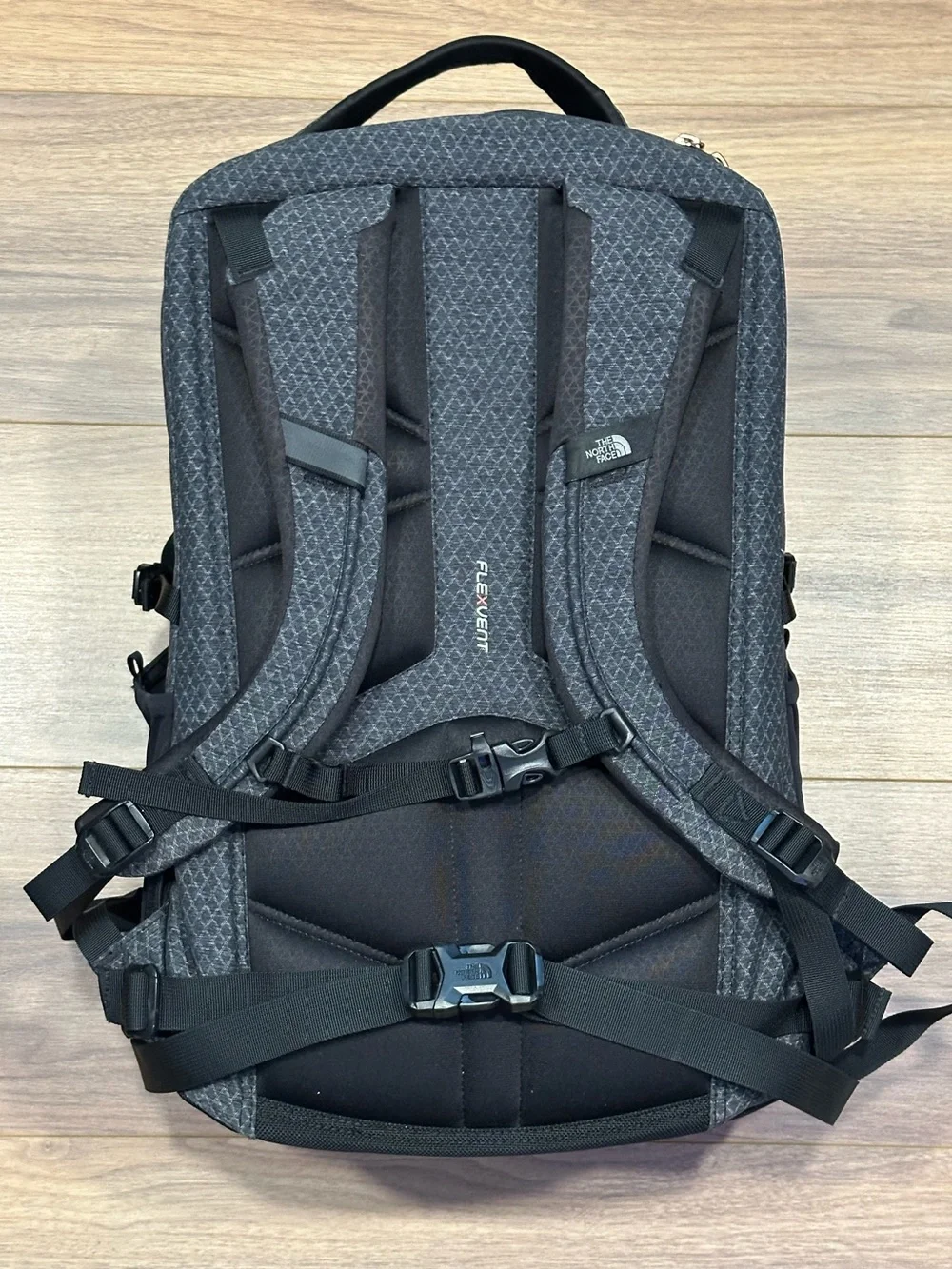 The North Face Surge Backpack in TNF Black Heather Copper/TNF Black